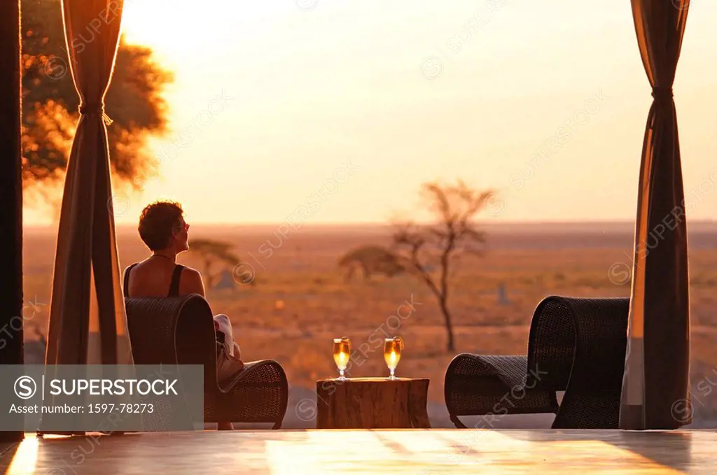 Sundowner, sunset, drink served, deck, The Fort, Fisher´s Pan, Onguma Safari Camp, Etosha, National Park, Kunene Region, Namibia, Africa, Travel, Natu...