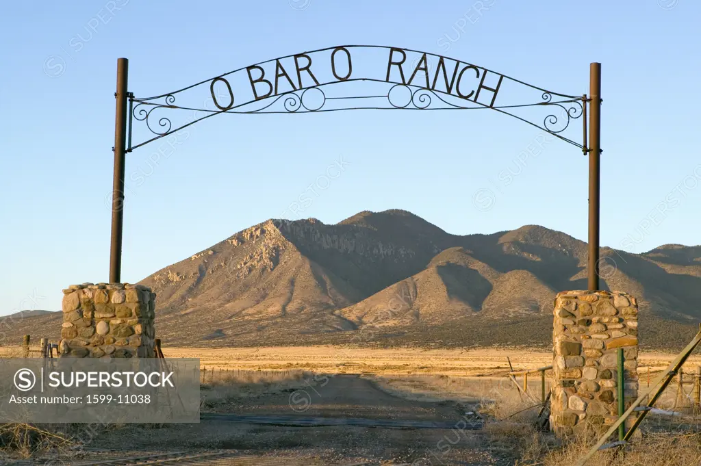 O'Bar'o Ranch gate and mountains at sunset in central New Mexico, Route 48 near Smokey Bear Historical Park