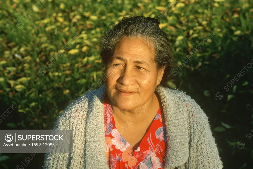 A Samoan woman smiling with the sun on her face, Garden Grove, CA