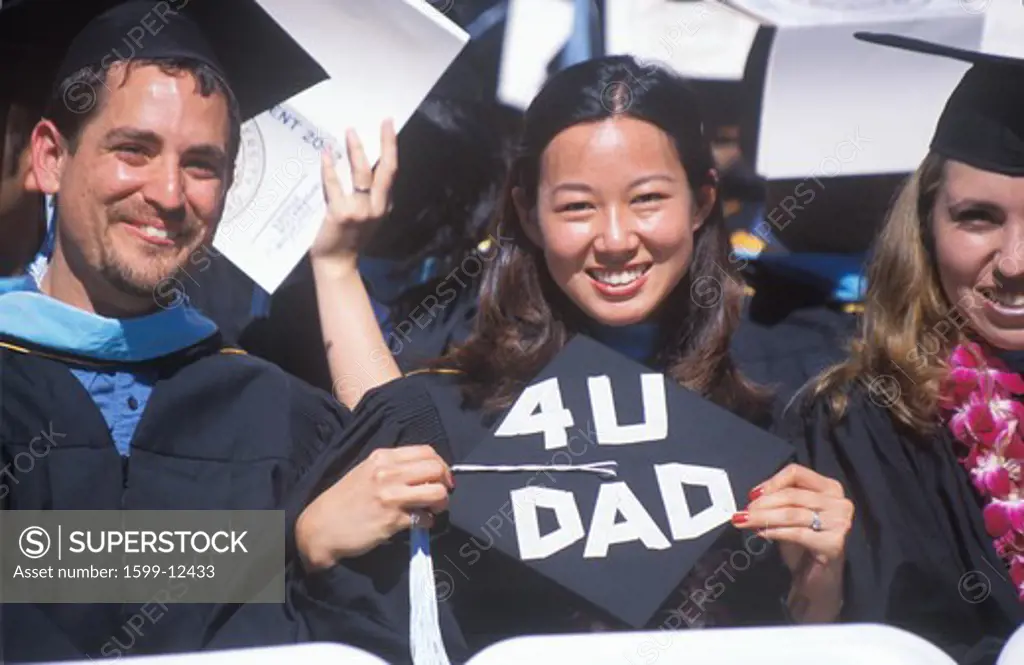 Female Asian-American UCLA graduate with For you Dad cap, Los Angeles, CA