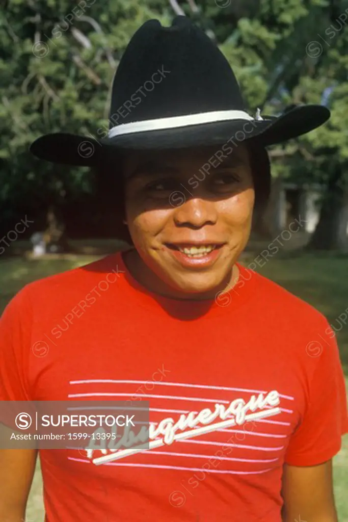 Native American Apache youth wearing cowboy hat, Bowie, AZ