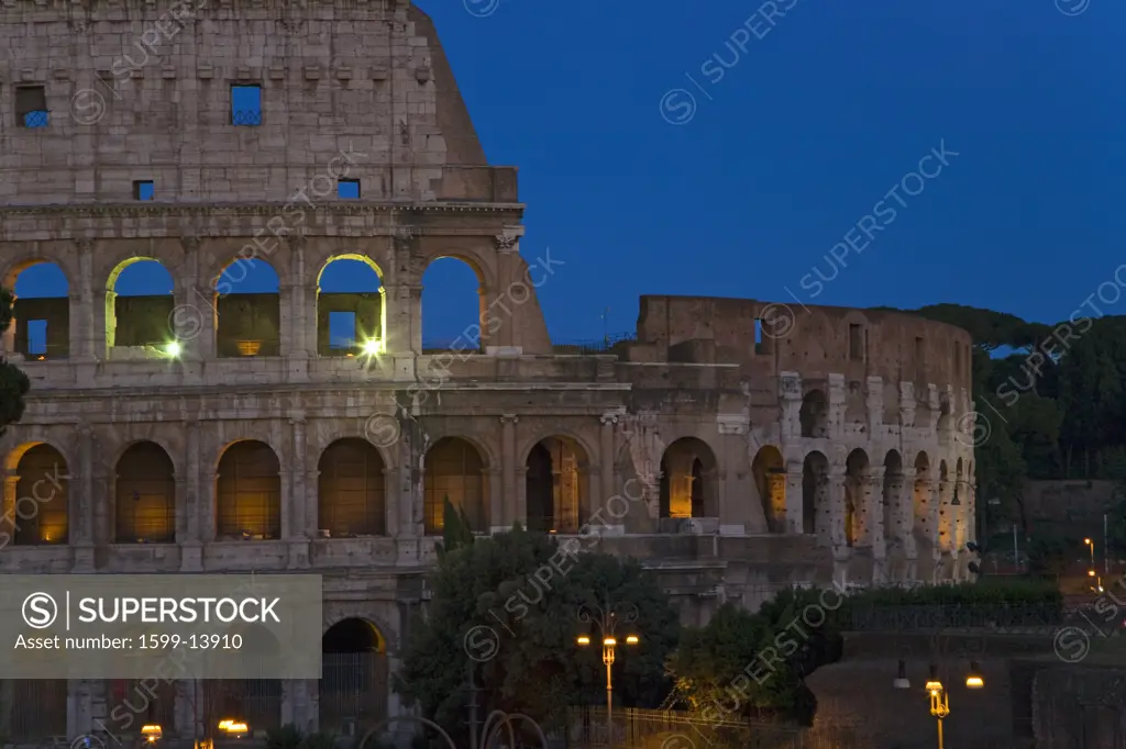 The Colosseum or Roman Coliseum at dusk, originally the Flavian Amphitheatre, an elliptical amphitheatre in the centre of the city of Rome, the largest ever built in the Roman Empire, Rome, Italy, Europe