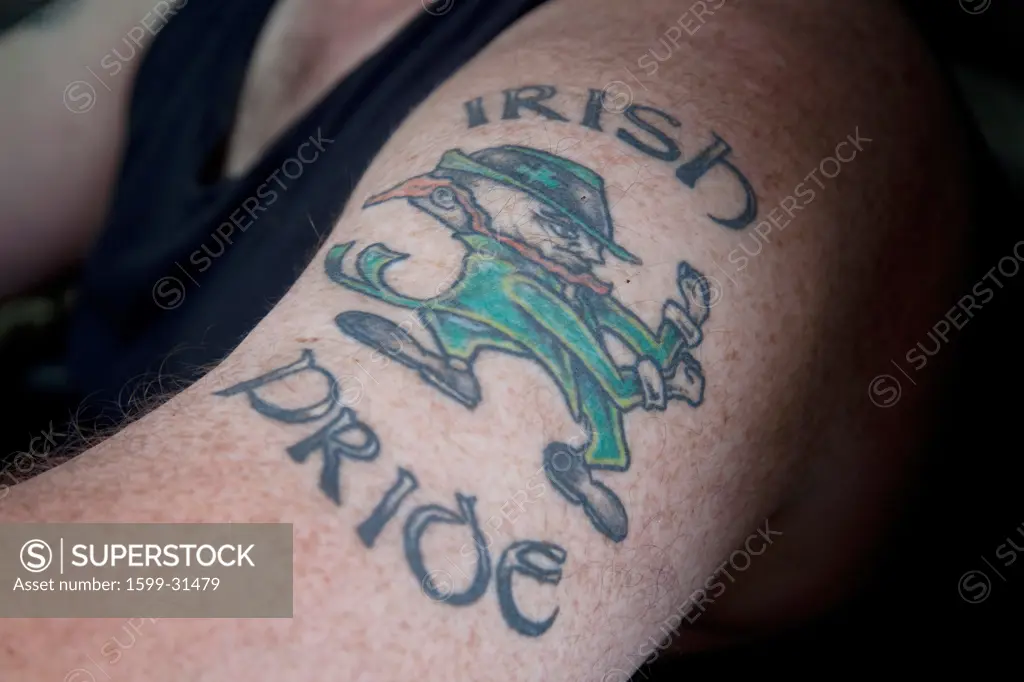 Closeup of ""Irish Pride"" tatoo on arm in Boston MA