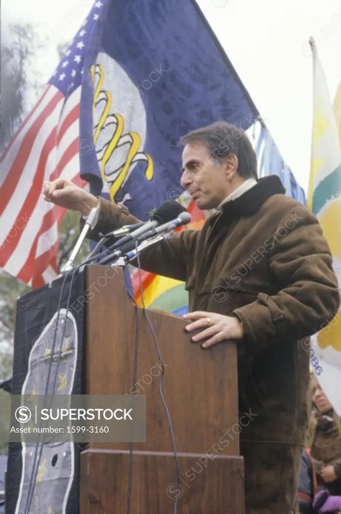 Political activist, Carl Sagan, speaking at rally, Washington D.C.