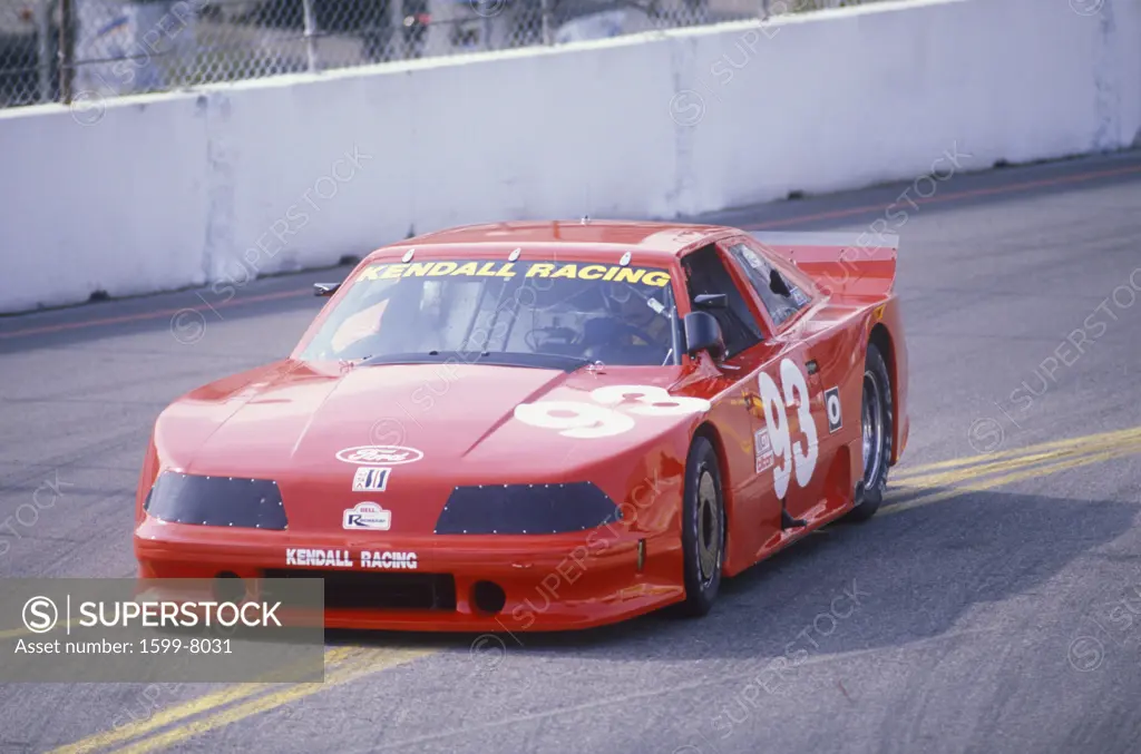 A red Mazda Trans AM in the Toyota Grand Prix Car Race Long Beach, CA