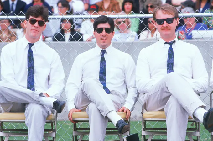 Three men wearing uniforms at a college event, University CA Los Angeles, CA