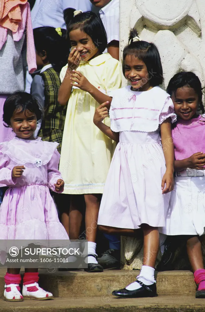 Easter island, Hanga Roa, little girl in front of Sebastian Engelbert museum