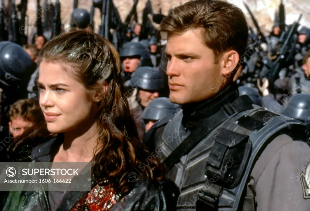 Denise Richards and Casper Van Dien , Starship Troopers , 1997 directed by Paul Verhoeven TriStar Pictures