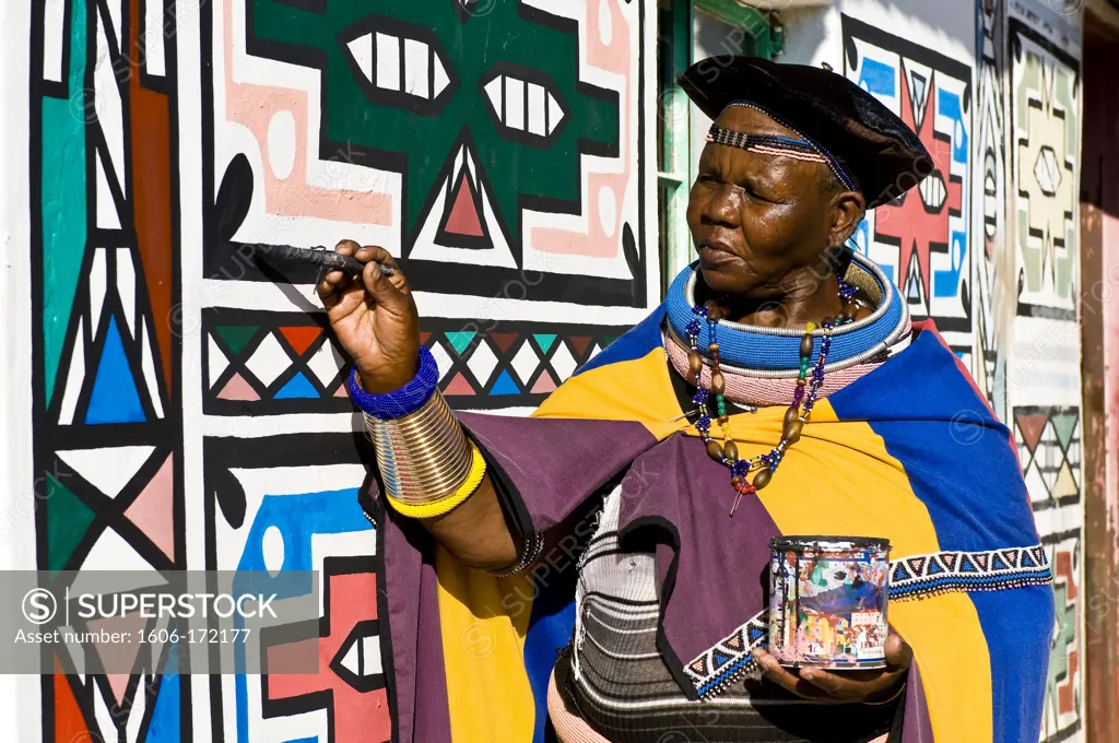 Africa, South Africa, Mpumalanga Province, KwaNdebele, Ndebele tribe, Mabhoko village, the artist Francina Mbonani painting her house