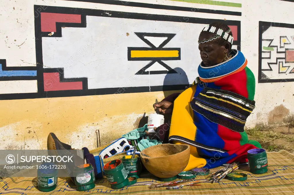 Africa, South Africa, Mpumalanga Province, KwaNdebele, Ndebele tribe, Mabhoko village, the artist Francina Ndimande painting her walls