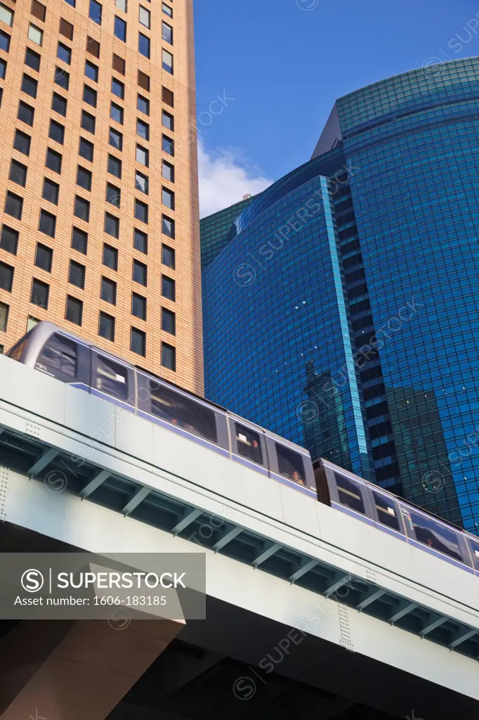 Japan,Tokyo,Shiodome,City Center Building,Office Lady on Mobile Phone