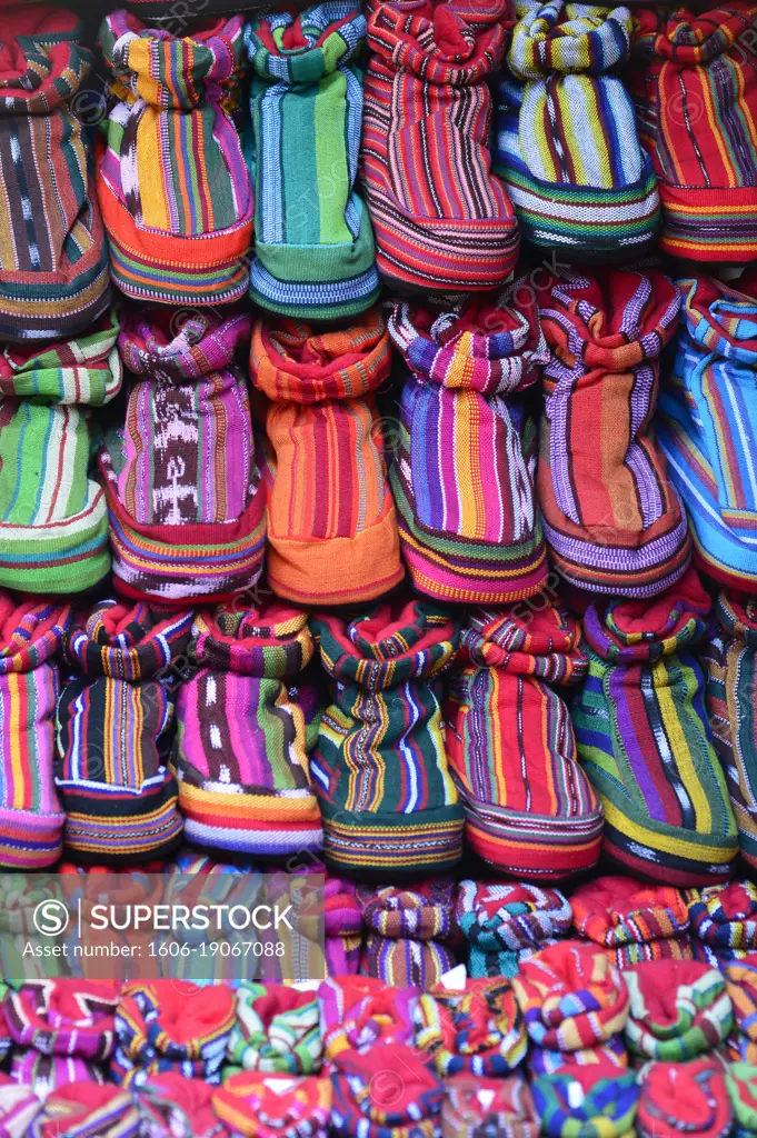 Multi-colored leather shoes in Chichicastenango market , Guatemala, Central America.