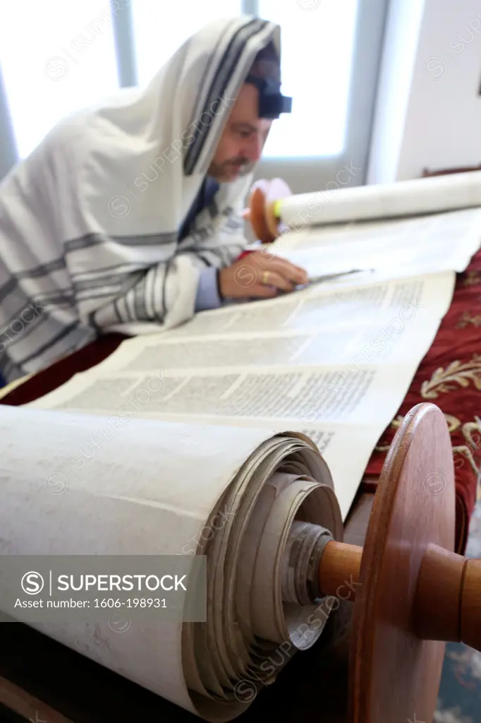 Reading The Torah In A Synagogue. Paris. France.