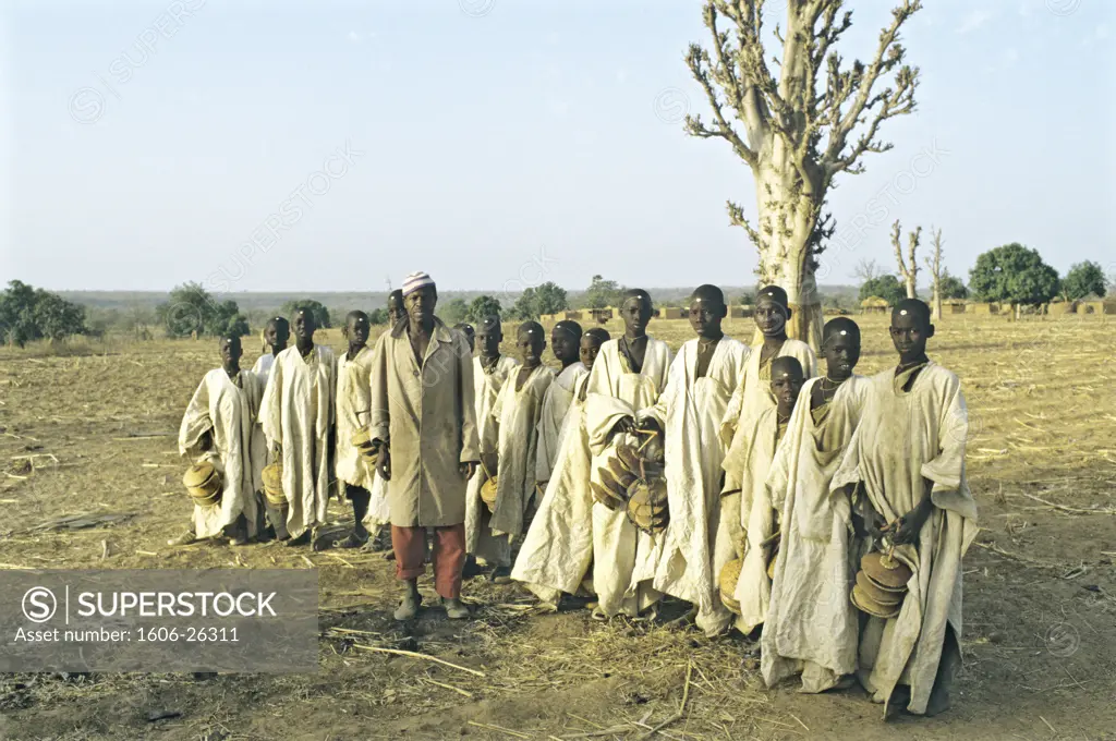 Mali, Dogon Country, circumcised boys with sistrums