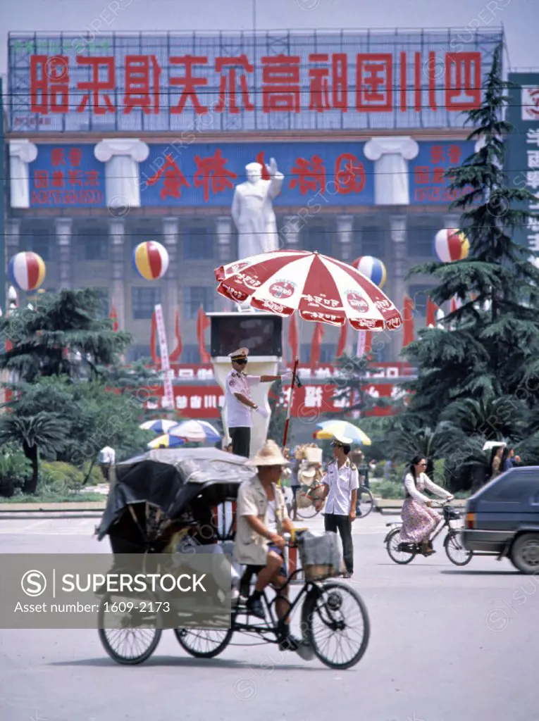 Rickshaw and Mao statue, Chengdu, Sichuan, China