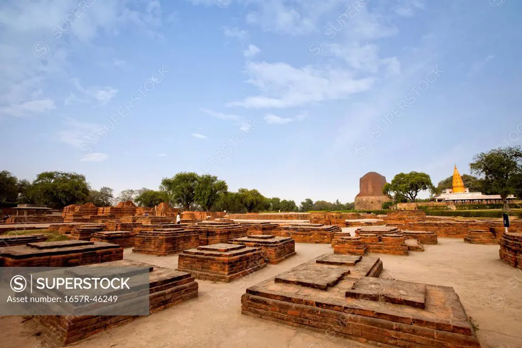 Ruins with stupa in background, Sarnath, Varanasi, Uttar Pradesh, India -  SuperStock