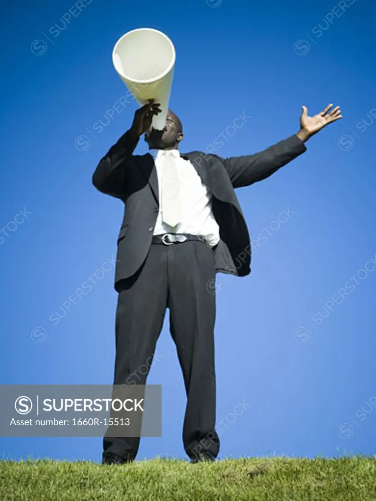 Man yelling through bullhorn