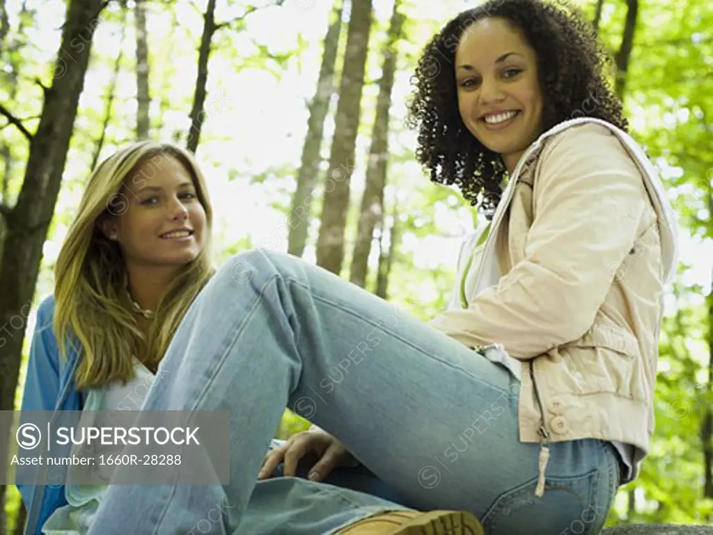 Portrait of two young women smiling