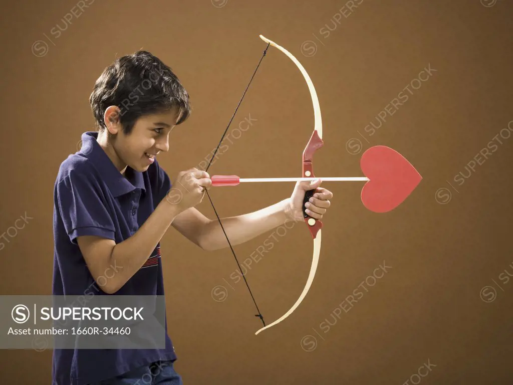 Boy with bow and arrow with heart on it