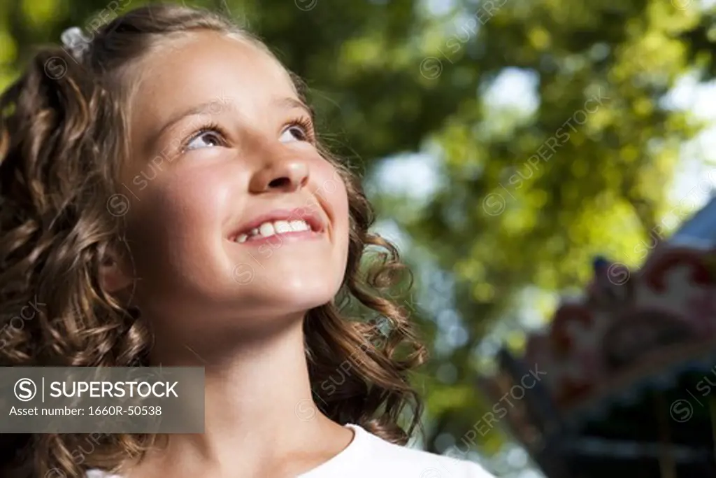 Girl posing in amusement park