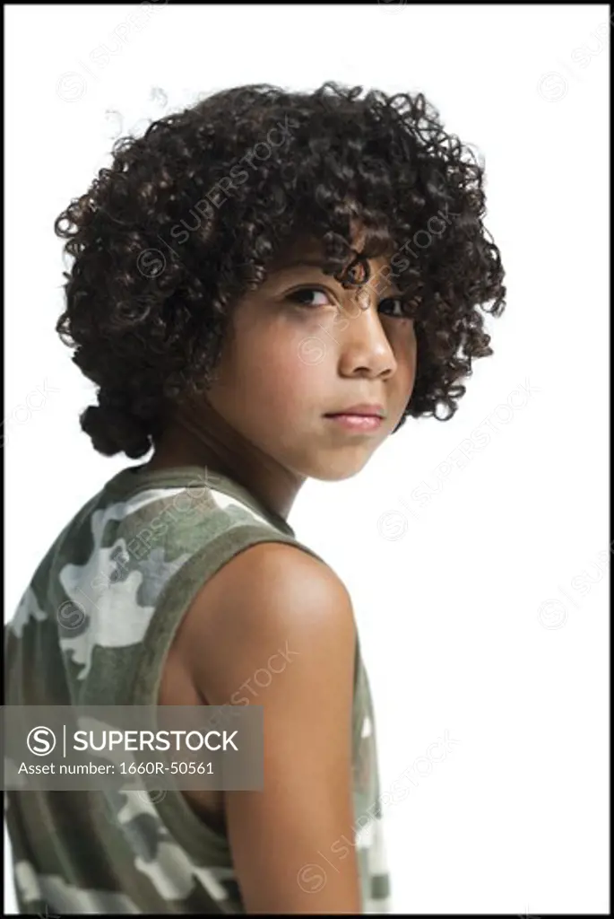 Boy posing with crossed arms