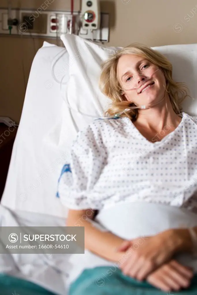 Woman in hospital bed