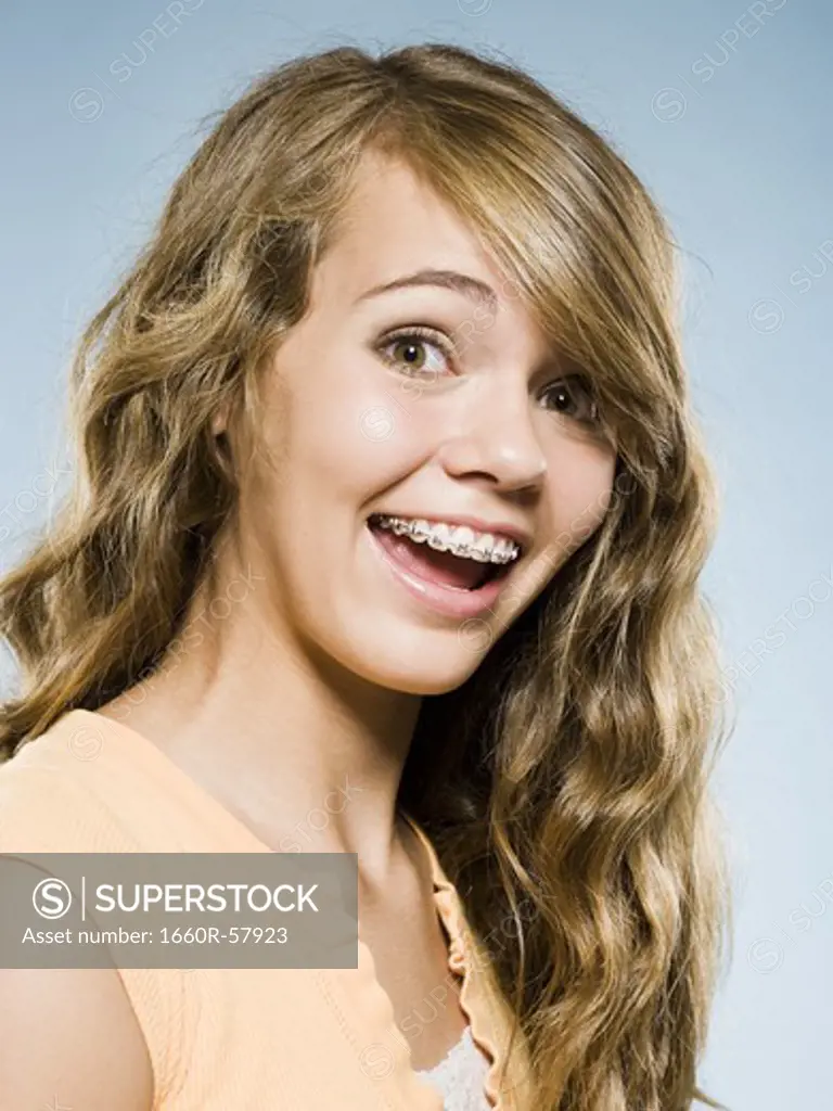 Portrait of a girl with braces smiling