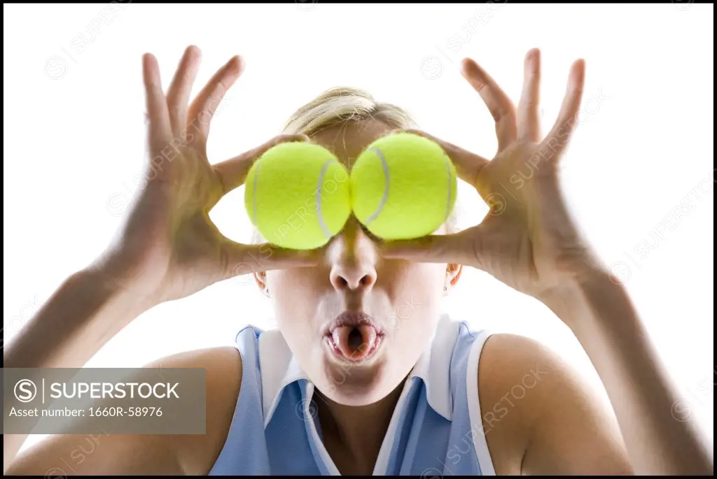 Woman with tennis ball eyes