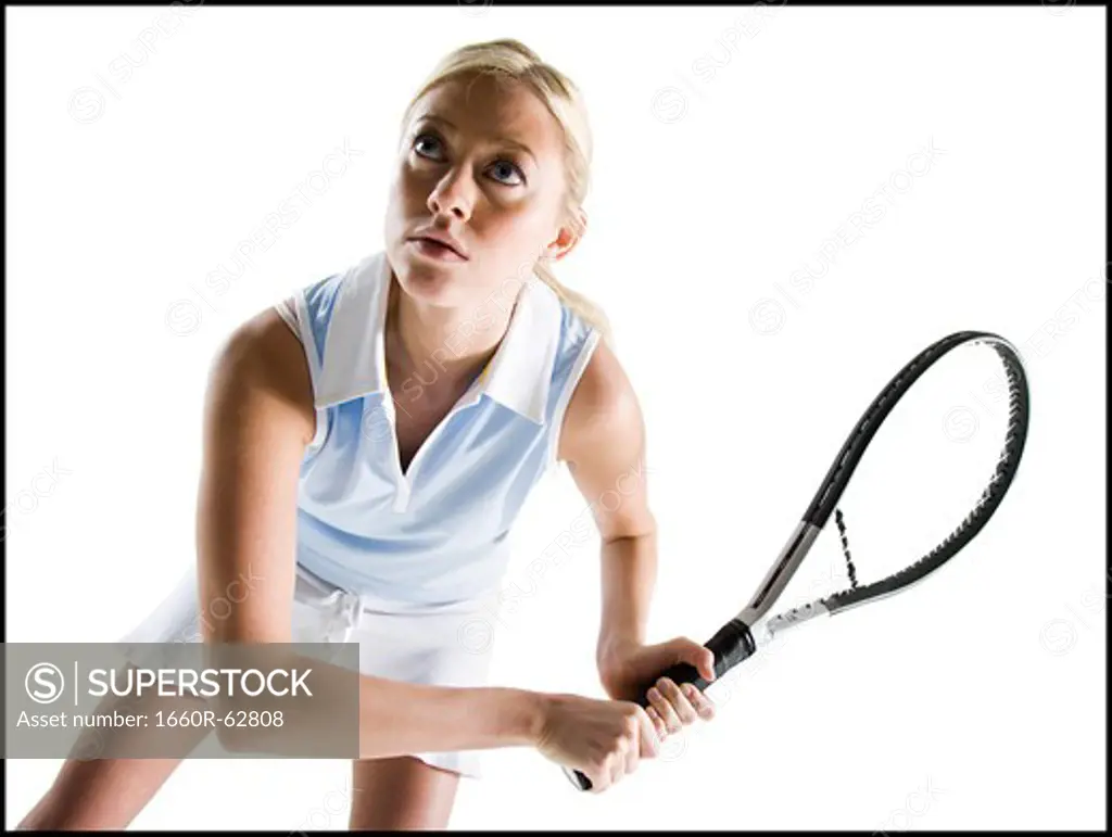 Tennis player with racket