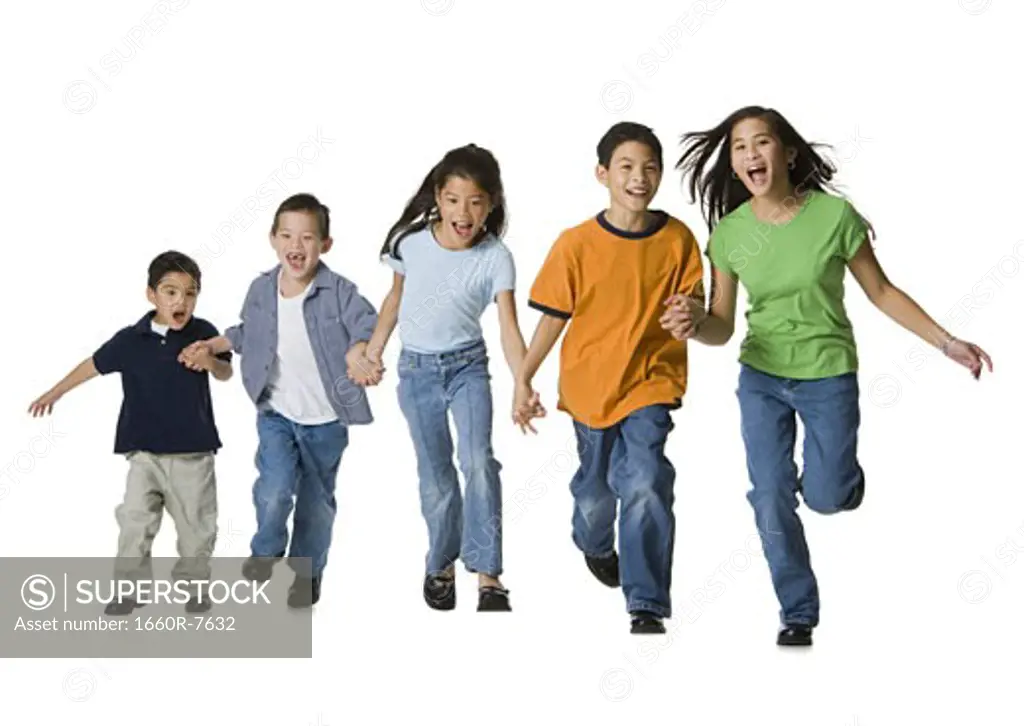 Group of children holding hands and running