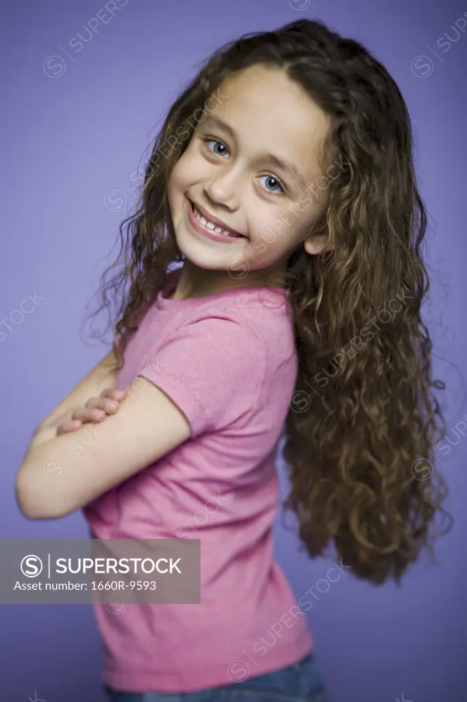 Profile of a girl standing with her Arms Crossed, Arms Folded