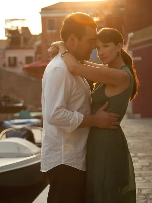 Italy, Venice, Mature couple embracing