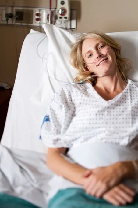 Woman in hospital bed