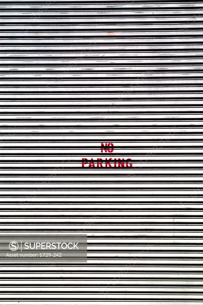 No parking sign on garage door, New York City, New York State, USA