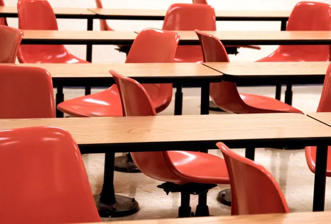 Tables and chairs in a college classroom