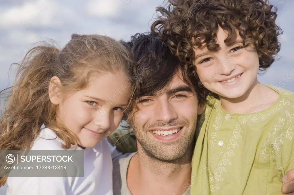 Portrait of a man with his children