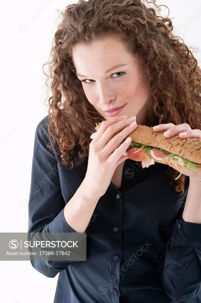 Woman eating a sandwich