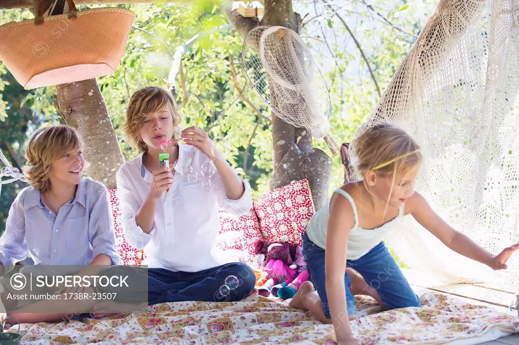 Children playing in tree house