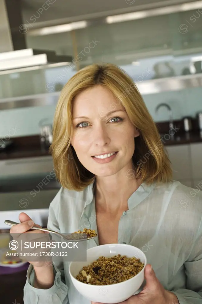 Portrait of a woman eating cereal