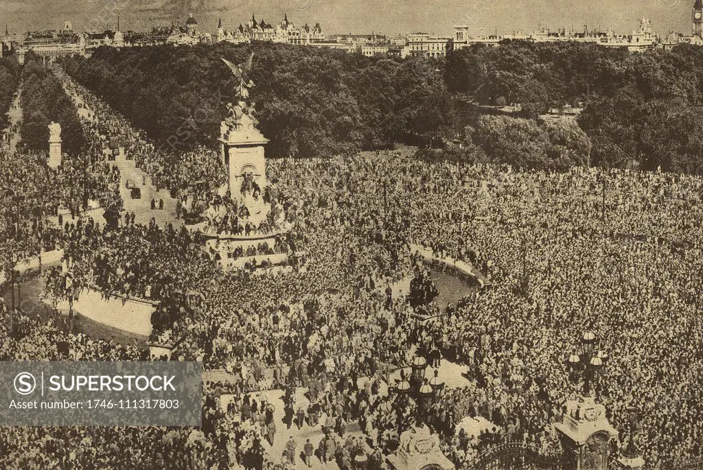 London crowds gather outside Buckingham Palace for VE Day celebrations in May 1945 to mark the end of World War Two in Europe.