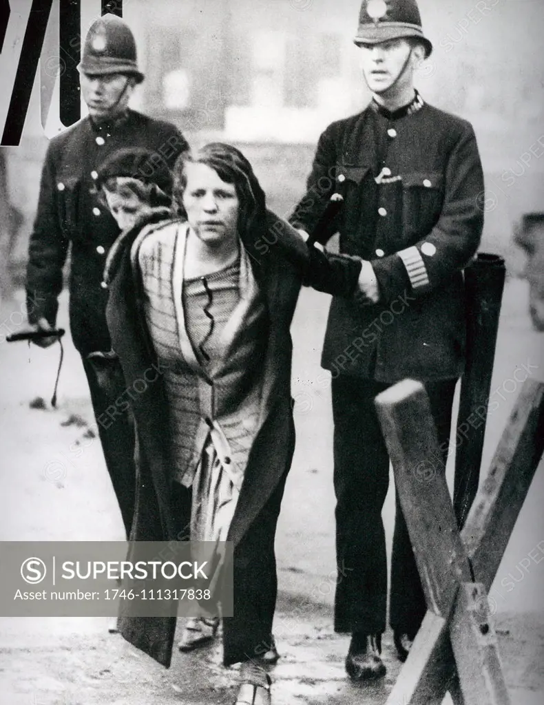 Suffragette arrested by police during a protest for women's suffrage (voting) circa 1910-12