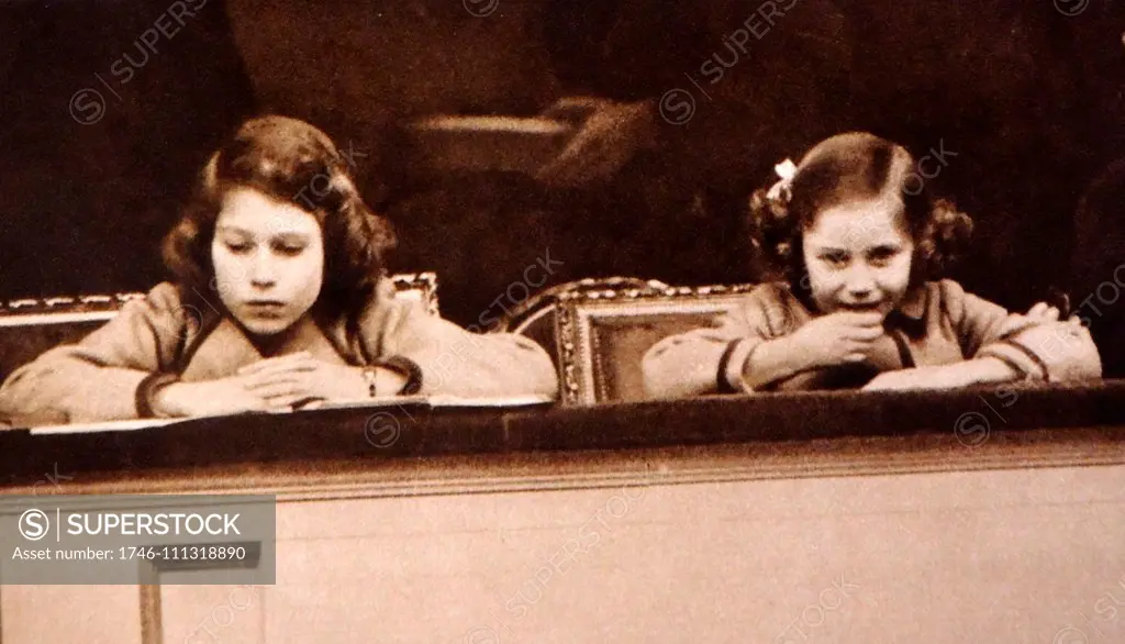 On March 3rd, Princess Elizabeth (later Queen Elizabeth II of Great Britain), and Princess Margaret attended the National Pony Show at the Royal Agricultural Hall. They are seen in this picture watching the children's competitions, Princess Margaret obviously very thrilled.