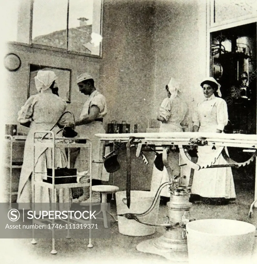 Teaching hospital with nurses and a doctor, France 1900