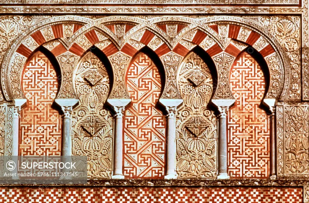 Detailed architectural feature from the Mosque-Cathedral of Córdoba. the Great Mosque of Córdoba is regarded as one of the most accomplished monuments of Moorish architecture. The site was originally a small temple of Christian Visigoth origin, the Catholic Basilica of Saint Vincent of Lérins. When Muslims conquered Spain in 711, the church was first divided into Muslim and Christian halves. This sharing arrangement of the site lasted until 784, when the Christian half was purchased by the Emir 