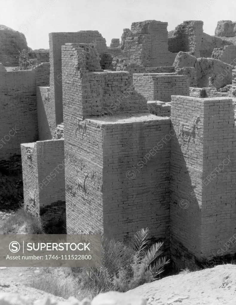 Iraq. Babylon, view of the crumbling ruins. The Ishtar gate showing animals embossed on brick walls