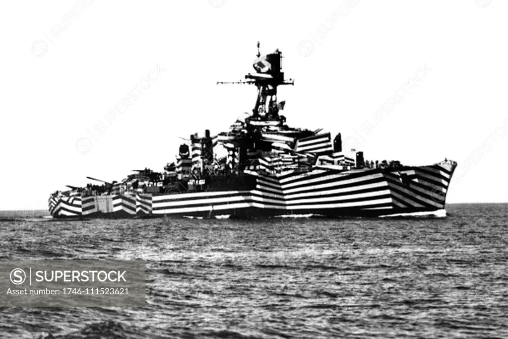 Photograph of a Dreadnought battleship in dazzle camouflage. The camouflage made it difficult to estimate a targets range, speed and heading. Dated 1917