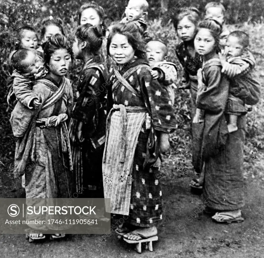 Photograph of a group of Japanese children in traditional costume. Dated 20th Century