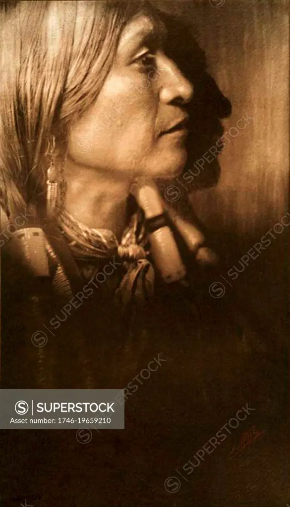 Native American Indian: A Jicarilla chief, c1904. Photograph by Edward Curtis (1868-1952).