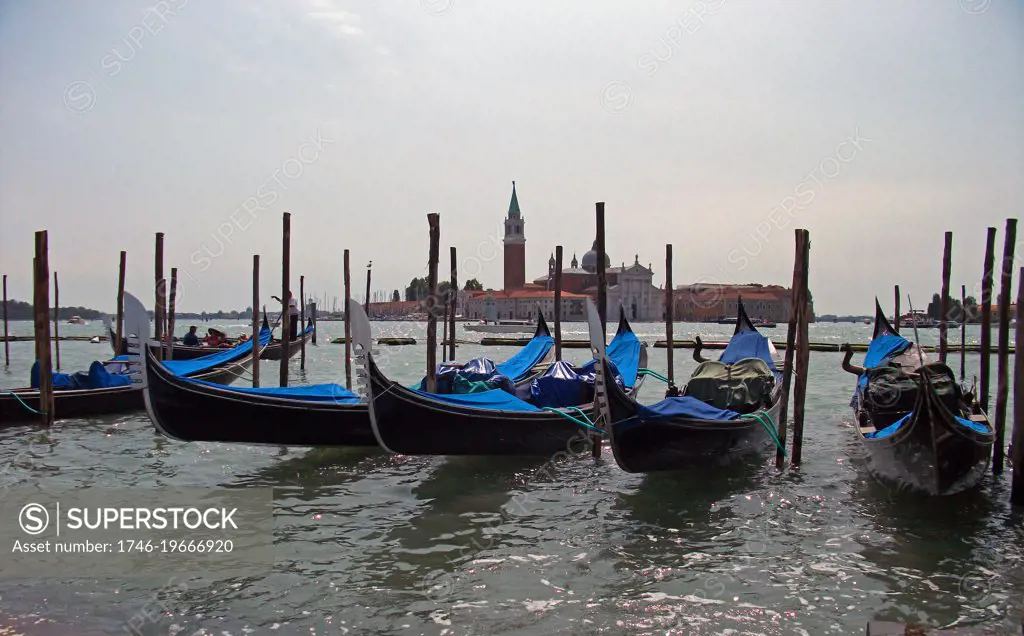 Gondolas moored at St Mark's square, Venice, Italy.