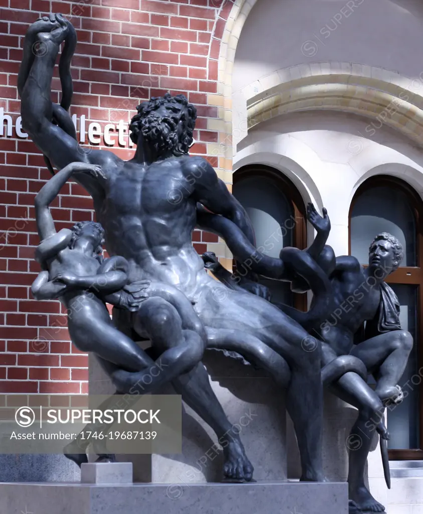 Bronze sculpture of laocoon by Francesco Righetti ( 1749-1819 ). Atrium courtyard of the Rijksmuseum, Amsterdam, Netherlands. Laocoon was a Trojan priest of Poseidon, whose rules he defied, either by marrying and having sons. He was subsequently subject to divine execution by two serpents.